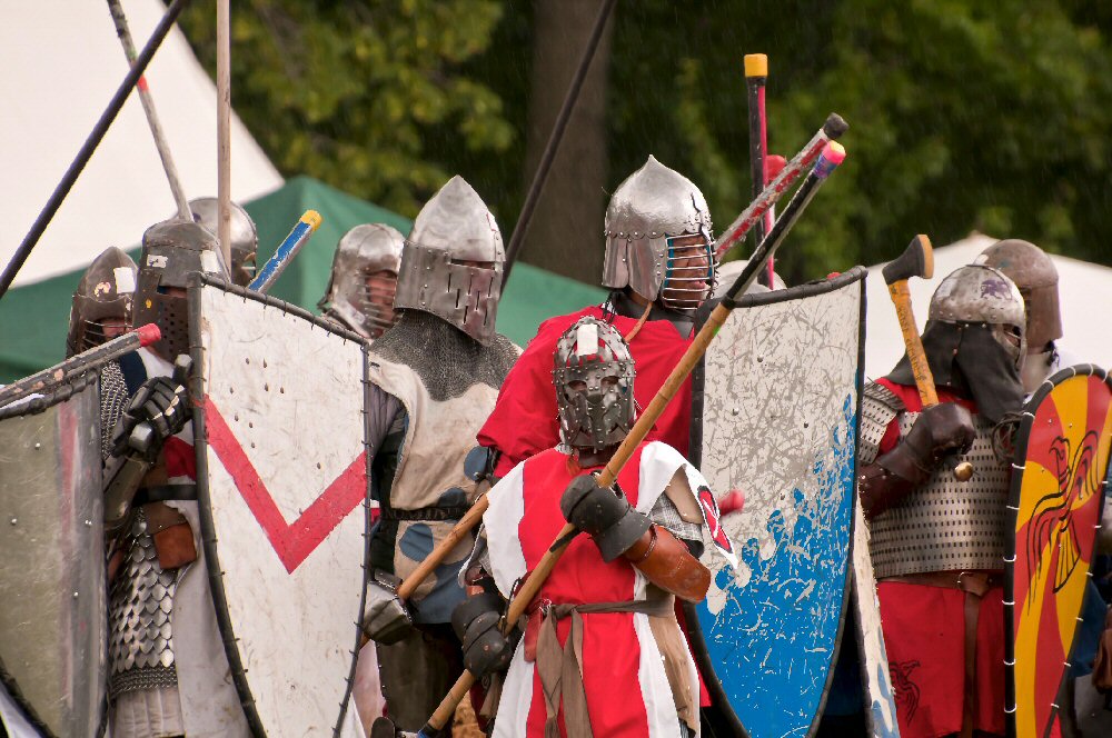 Slideshow of armored and rapier combat, archery