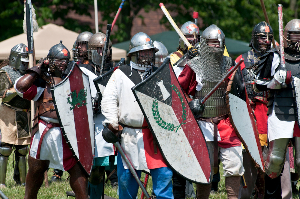 Slideshow of armored and rapier combat, archery